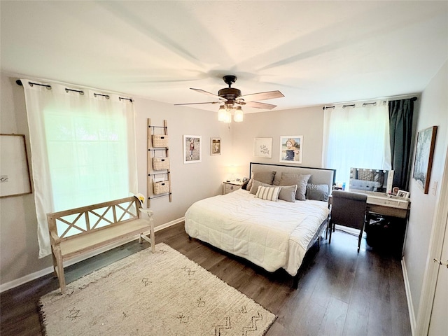 4124 Maryview Ct, Haltom City, TX 76117 - bedroom featuring dark wood-style floors and ceiling fan