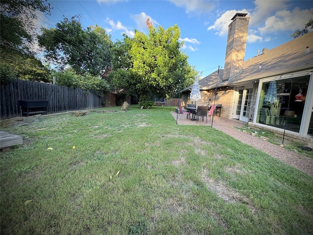 4124 Maryview Ct, Haltom City, TX 76117 - fenced backyard with a patio area