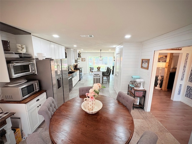 4124 Maryview Ct, Haltom City, TX 76117 - dining area with recessed lighting and light wood finished floors
