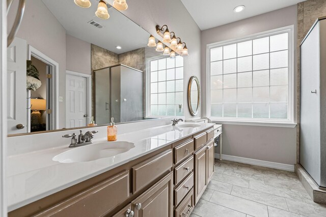 1904 Yarmouth Ct, Mansfield, TX 76063 - bathroom featuring double vanity, a stall shower, and ensuite bath