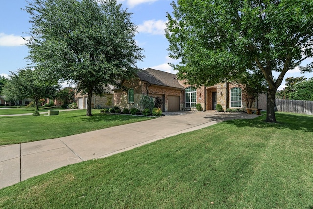 1904 Yarmouth Ct, Mansfield, TX 76063 - obstructed view of property featuring a garage, driveway, and brick siding