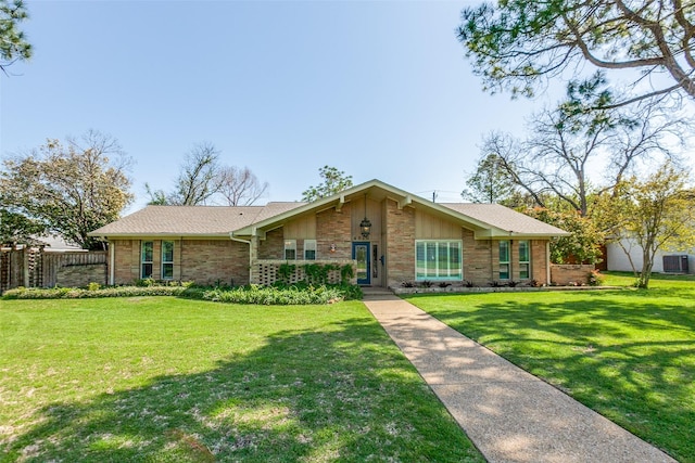 4818 Thunder Rd, Dallas, TX 75244 - view of front of property featuring stone siding and a shingled roof