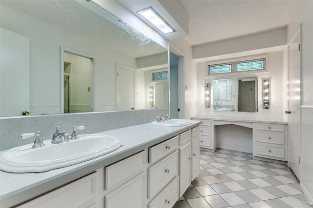 4818 Thunder Rd, Dallas, TX 75244 - full bathroom featuring double vanity and tile patterned flooring