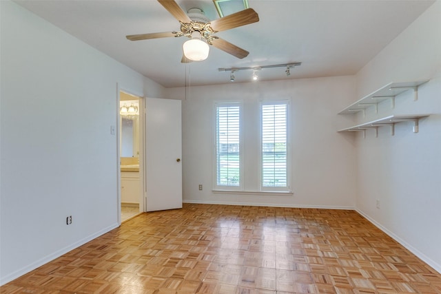 4818 Thunder Rd, Dallas, TX 75244 - empty room featuring track lighting and a ceiling fan