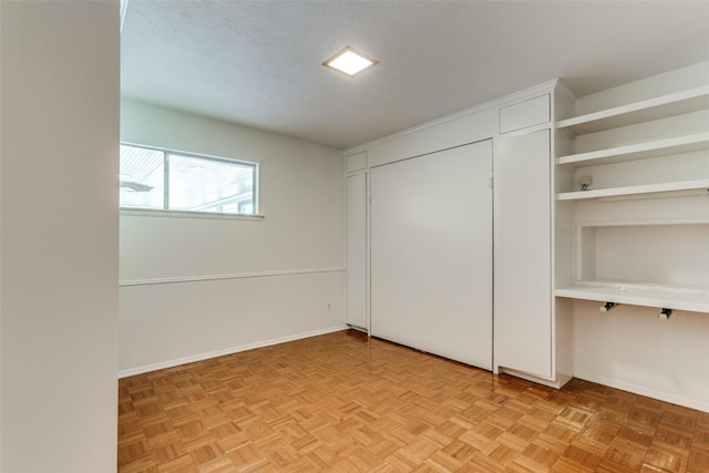 4818 Thunder Rd, Dallas, TX 75244 - unfurnished bedroom with a closet and baseboards