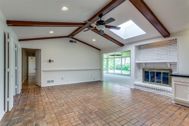 4818 Thunder Rd, Dallas, TX 75244 - unfurnished living room featuring a skylight, brick patterned floors, ceiling fan, a fireplace, and recessed lighting