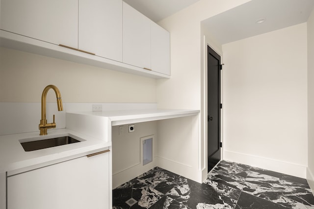 3939 Hawthorne Unit 103, Dallas, TX 75219 - washroom with cabinet space, marble finish flooring, and electric dryer hookup