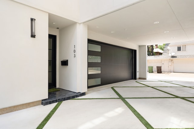 3939 Hawthorne Unit 103, Dallas, TX 75219 - garage with recessed lighting