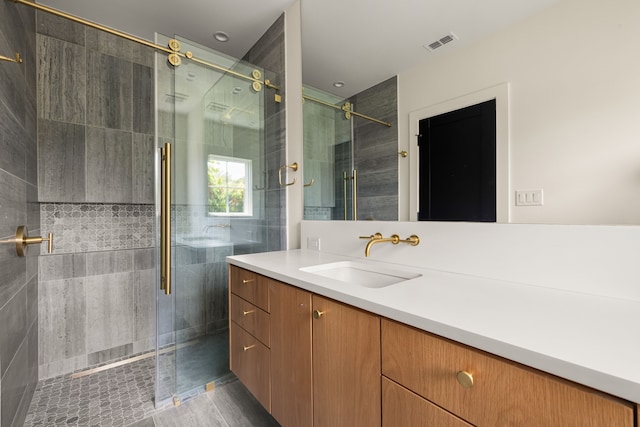 3939 Hawthorne Unit 103, Dallas, TX 75219 - full bath with vanity and a shower stall