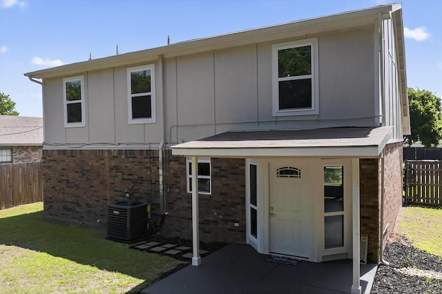 1521 Windsor Dr, Glenn Heights, TX 75154 - rear view of property with brick siding
