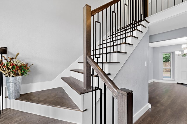 1521 Windsor Dr, Glenn Heights, TX 75154 - stairway featuring wood finished floors and a chandelier