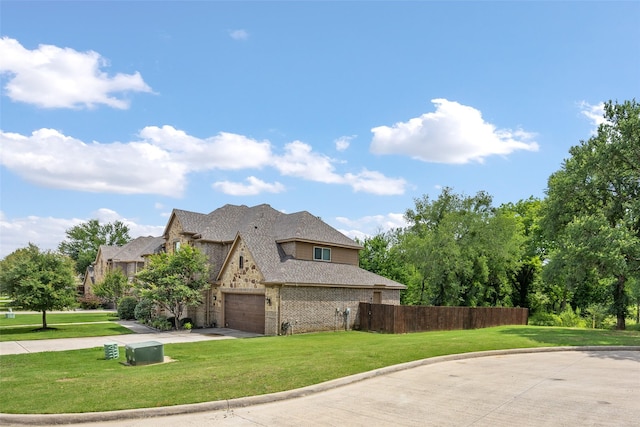 605 Pine Island Cir, Mansfield, TX 76063 - view of side of home featuring driveway, brick siding, and roof with shingles