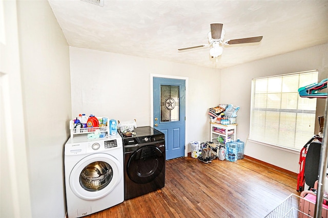 1561 Fm 1816, Bowie, TX 76230 - laundry area featuring washer and dryer, wood finished floors, and a ceiling fan
