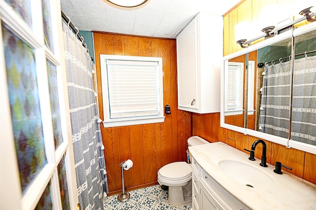 1561 Fm 1816, Bowie, TX 76230 - bathroom featuring wood walls and vanity