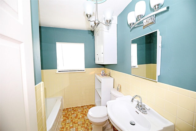 1561 Fm 1816, Bowie, TX 76230 - full bathroom with tile walls, a bath, and wainscoting