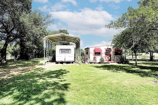 1561 Fm 1816, Bowie, TX 76230 - view of grassy yard featuring a detached carport