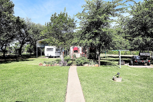 1561 Fm 1816, Bowie, TX 76230 - view of grassy yard featuring a carport
