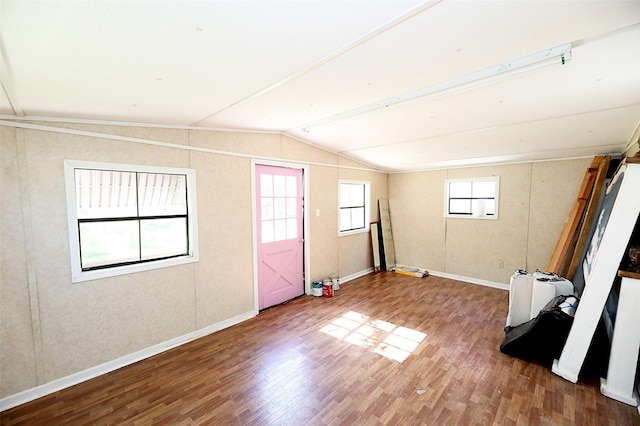 1561 Fm 1816, Bowie, TX 76230 - unfurnished room with lofted ceiling and wood finished floors