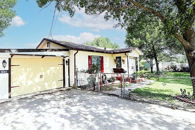 1561 Fm 1816, Bowie, TX 76230 - ranch-style house with an attached garage and driveway