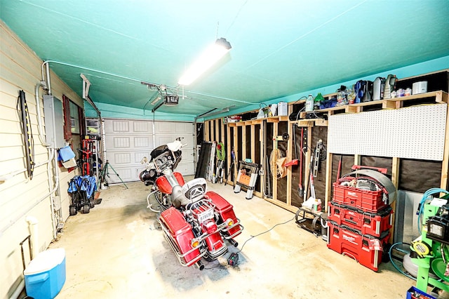 1561 Fm 1816, Bowie, TX 76230 - garage with a garage door opener and electric panel