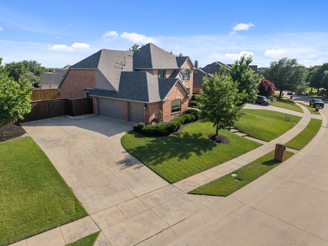 750 Camden Way, Prosper, TX 75078 - view of front of home with brick siding, concrete driveway, a garage, and roof with shingles