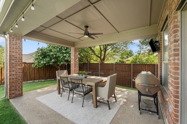 750 Camden Way, Prosper, TX 75078 - fenced backyard featuring a ceiling fan, a patio area, outdoor dining area, and area for grilling