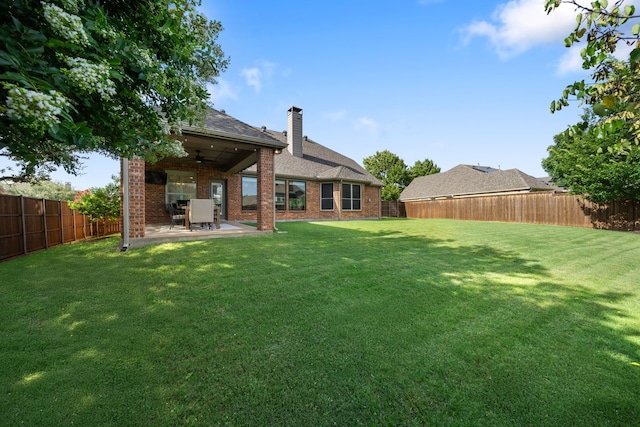 750 Camden Way, Prosper, TX 75078 - rear view of property with a fenced backyard, brick siding, a patio, and a chimney