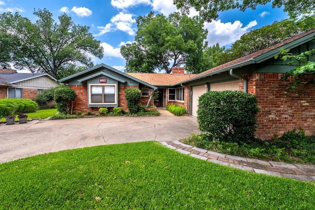 5912 Whitman Ave, Fort Worth, TX 76133 - ranch-style home featuring a garage, driveway, brick siding, and a front lawn