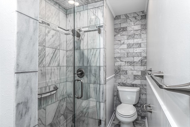 5912 Whitman Ave, Fort Worth, TX 76133 - full bath featuring a shower stall, tile walls, and wainscoting