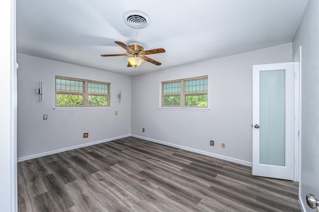 5912 Whitman Ave, Fort Worth, TX 76133 - empty room with a ceiling fan and dark wood finished floors