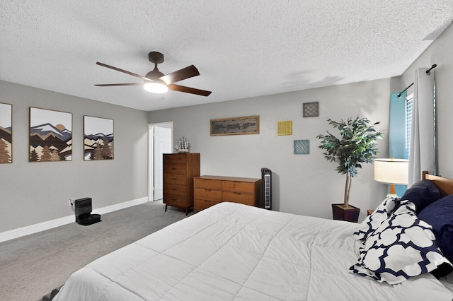 5700 Kingstree Ct, Arlington, TX 76017 - carpeted bedroom featuring a textured ceiling and a ceiling fan