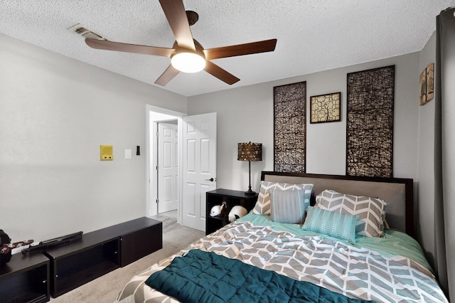 5700 Kingstree Ct, Arlington, TX 76017 - bedroom with carpet floors, a textured ceiling, and ceiling fan
