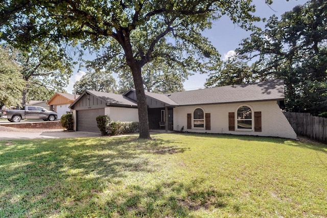 5700 Kingstree Ct, Arlington, TX 76017 - view of front of property featuring board and batten siding, a garage, brick siding, and driveway