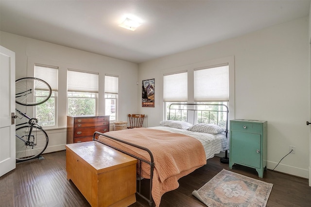 4711 Birchman Ave, Fort Worth, TX 76107 - bedroom with dark wood-style floors and baseboards