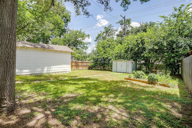 4711 Birchman Ave, Fort Worth, TX 76107 - fenced backyard with a storage unit and a garden