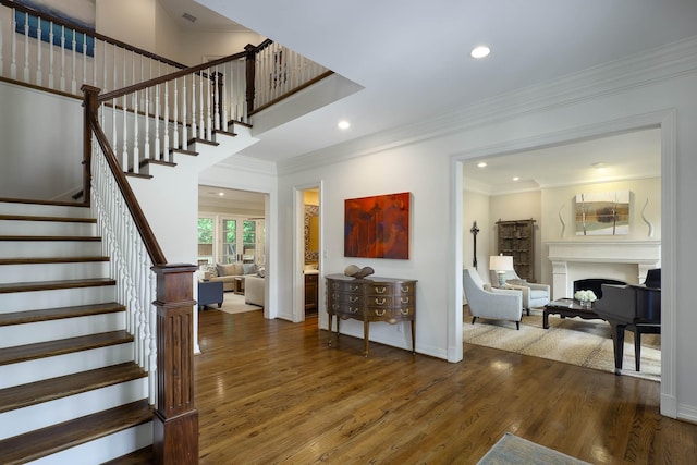 3817 Centenary Ave, University Park, TX 75225 - stairs with wood finished floors, a fireplace, recessed lighting, and crown molding