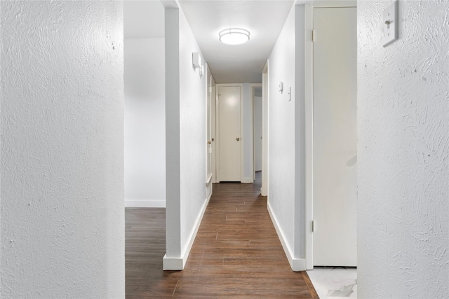 1007 Elk Grove Dr, Richardson, TX 75081 - hall featuring wood finished floors and a textured wall