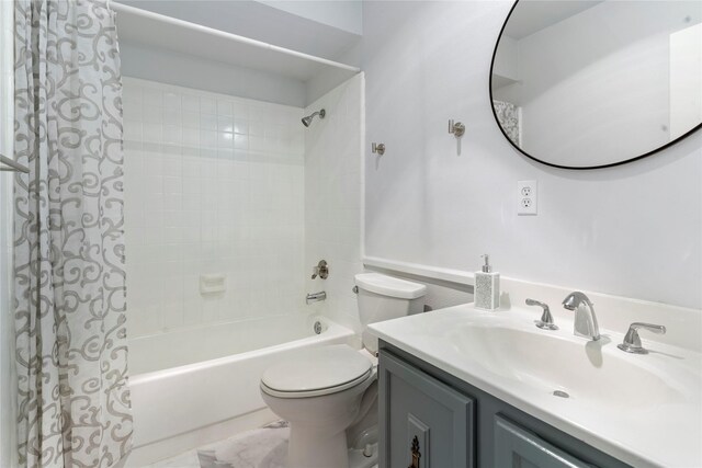 1007 Elk Grove Dr, Richardson, TX 75081 - bathroom featuring shower / bath combo with shower curtain and vanity