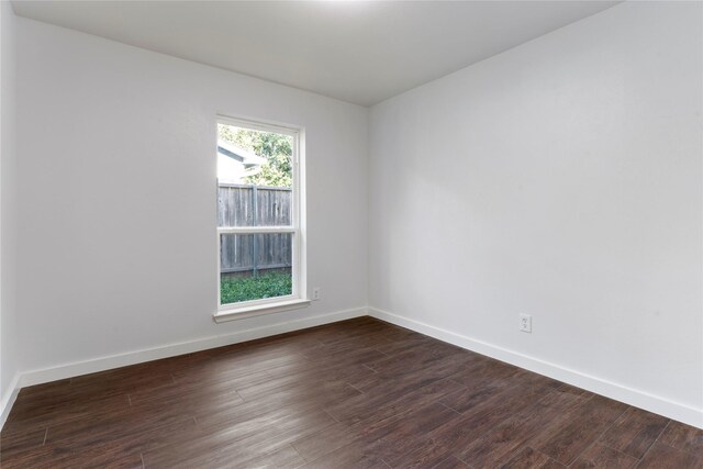 1007 Elk Grove Dr, Richardson, TX 75081 - unfurnished room with dark wood-style flooring and baseboards