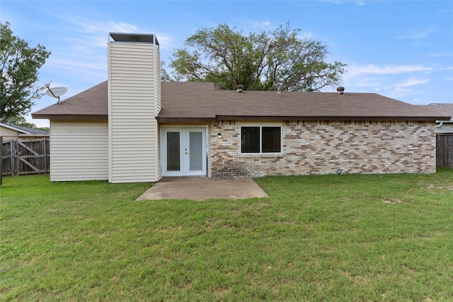 1007 Elk Grove Dr, Richardson, TX 75081 - rear view of property featuring french doors, brick siding, a chimney, and a patio area