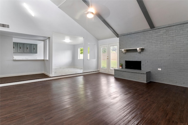1007 Elk Grove Dr, Richardson, TX 75081 - unfurnished living room featuring ceiling fan, dark wood-style floors, a brick fireplace, high vaulted ceiling, and beam ceiling