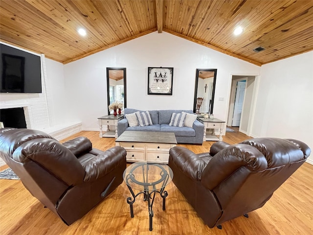 101 Branch St, Pittsburg, TX 75686 - living area featuring vaulted ceiling, wood finished floors, wood ceiling, and a fireplace