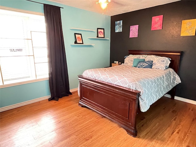 101 Branch St, Pittsburg, TX 75686 - bedroom featuring light wood-style flooring