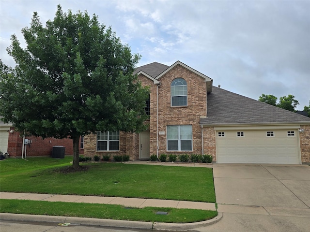 602 Dover Park Trl, Mansfield, TX 76063 - view of front of property featuring a garage, concrete driveway, a front lawn, brick siding, and roof with shingles