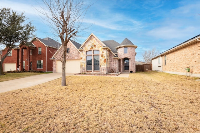 211 Wooded Creek Ave, Wylie, TX 75098 - french country home with concrete driveway, an attached garage, and brick siding