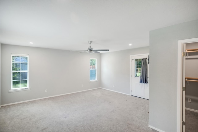 104 Charles Ln, Terrell, TX 75160 - carpeted empty room featuring healthy amount of natural light, recessed lighting, and a ceiling fan