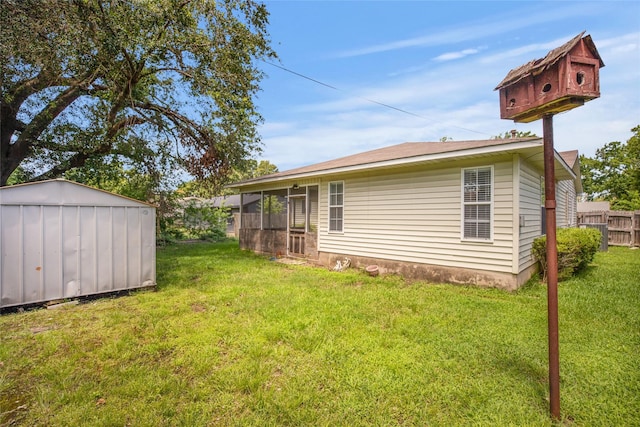 104 Charles Ln, Terrell, TX 75160 - view of yard with a storage unit and a sunroom