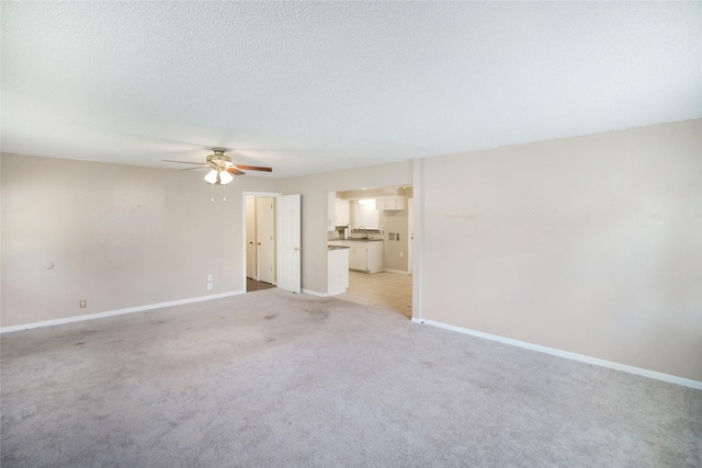 104 Charles Ln, Terrell, TX 75160 - empty room with a ceiling fan and light colored carpet