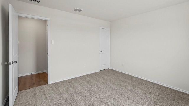 441 Drake Dr, Ferris, TX 75125 - carpeted empty room with baseboards