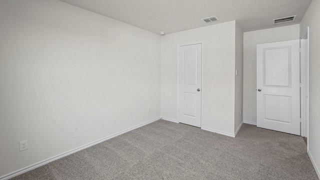 441 Drake Dr, Ferris, TX 75125 - unfurnished bedroom with carpet floors and baseboards